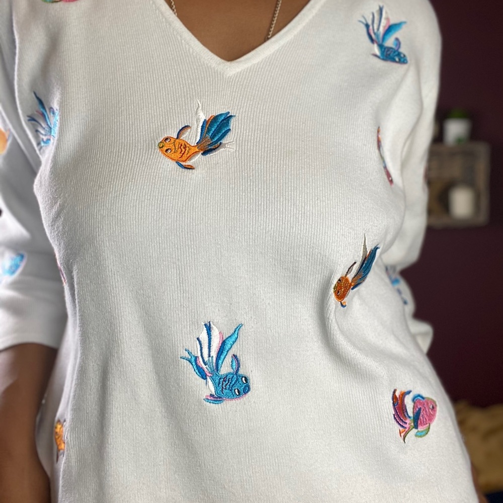 Fish sweater that is too cute.